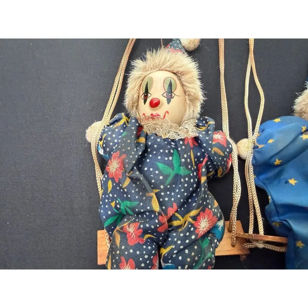 Pair of Vintage Hanging Porcelain Face Clowns Wooden Swings Star Floral Fabric